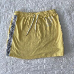NEW LF The Brand Yellow Tracker Skirt